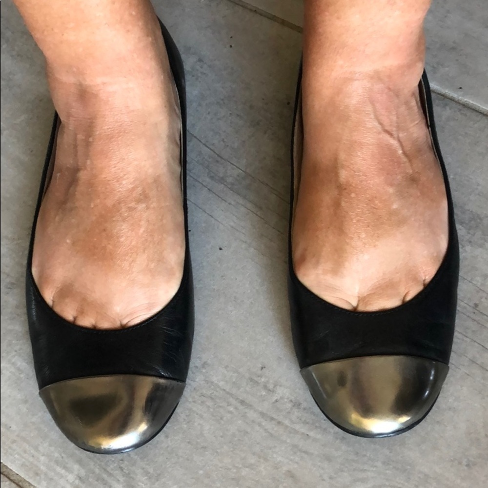 Black and pewter spectacular flats.